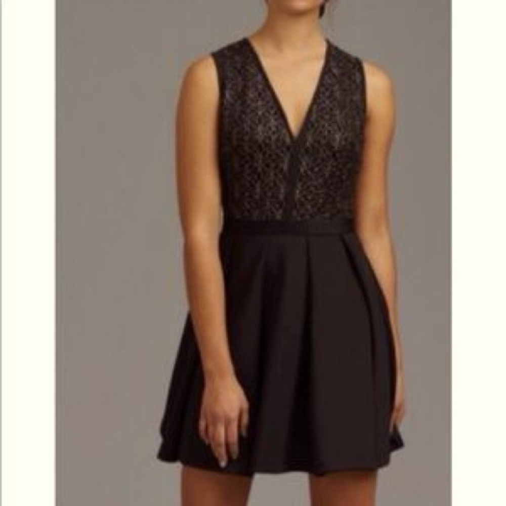 361-Dynamite black with gold overlay and criss cross back cocktail dress